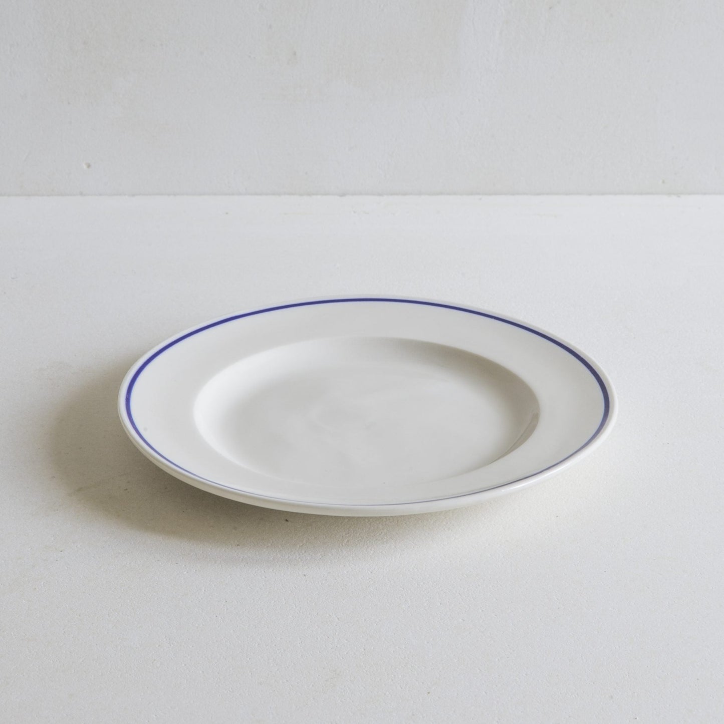 Porcelain side plate with blue line