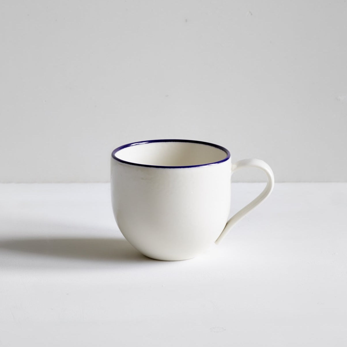 Simple Porcelain Mug with Cobalt Blue Rim